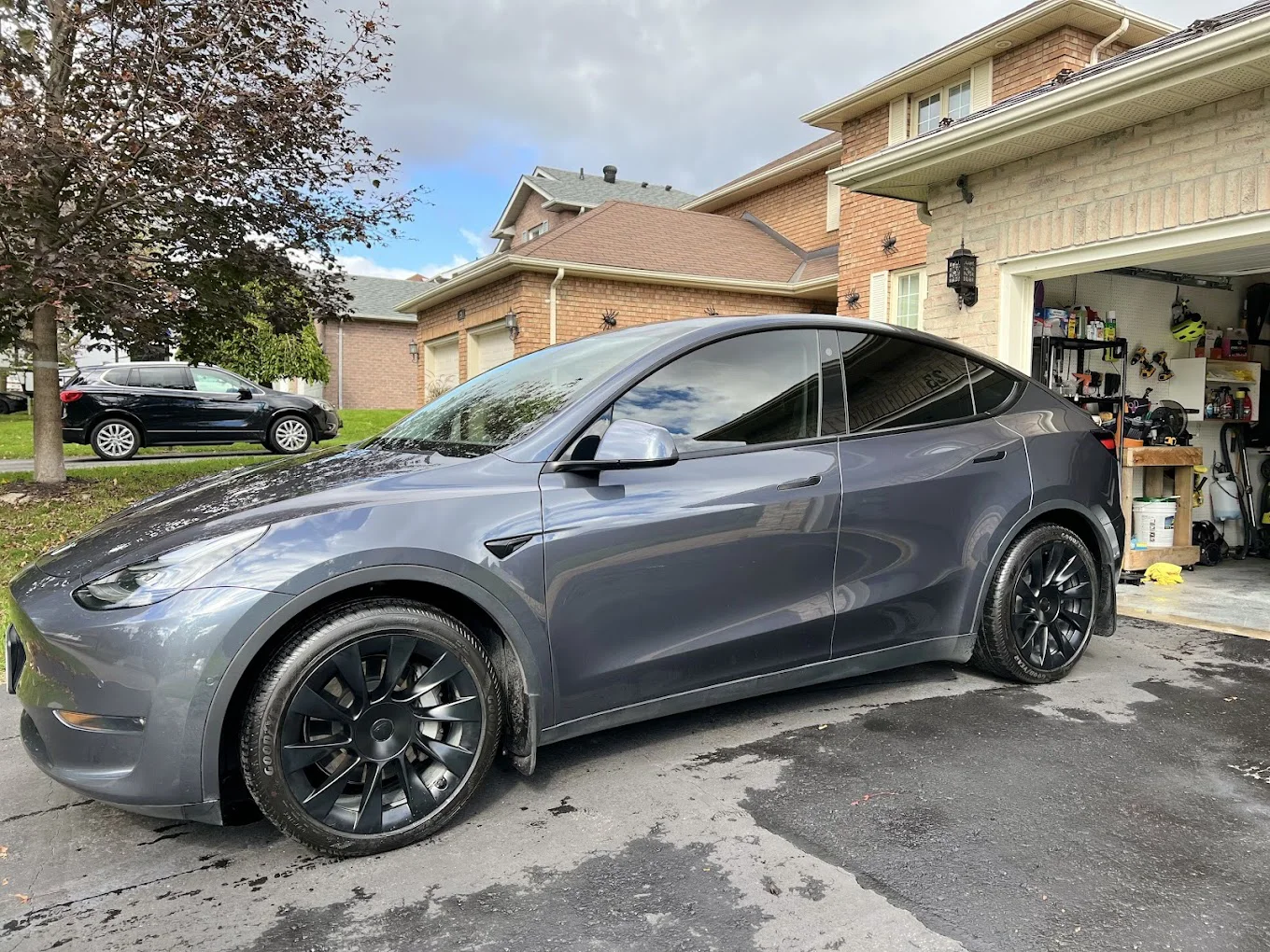 Silver Tesla with tint and protection